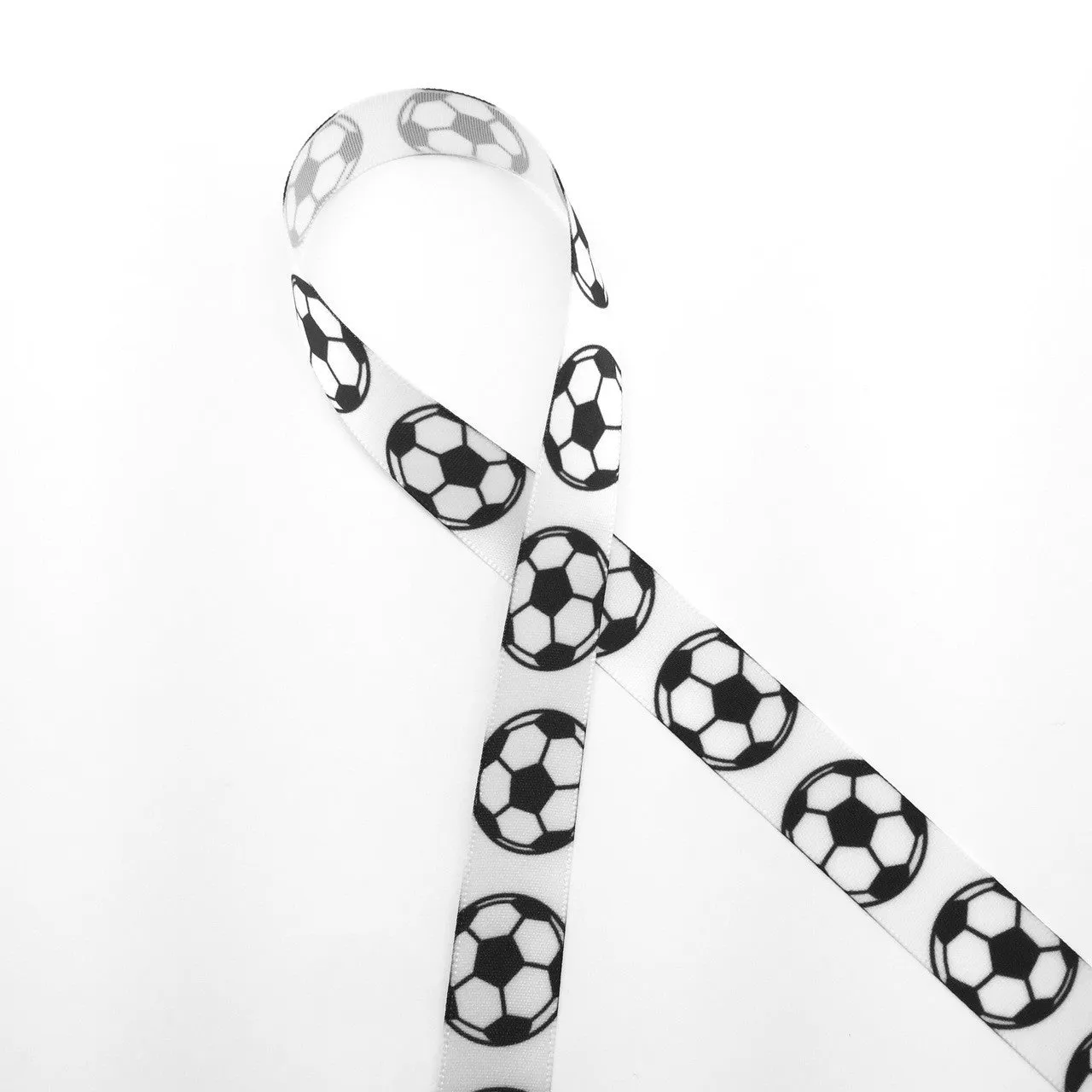 Soccer Ball Ribbon black and white soccer balls printed on 5/8" white single face satin or grosgrain